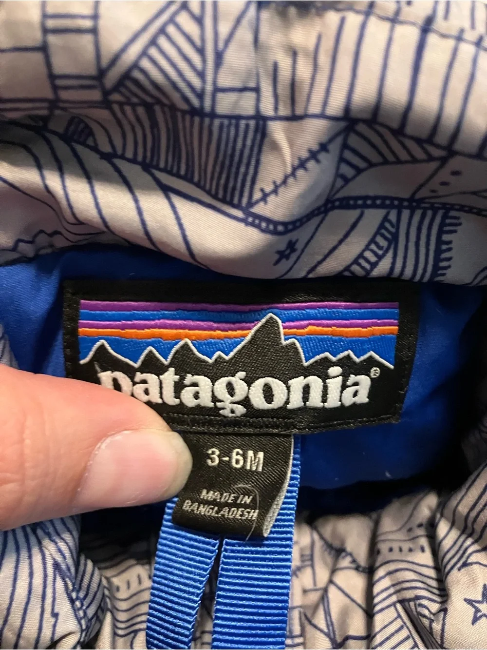 Patagonia Toddler Quilted Puffer Jacket in Light Gray with Blue Trim